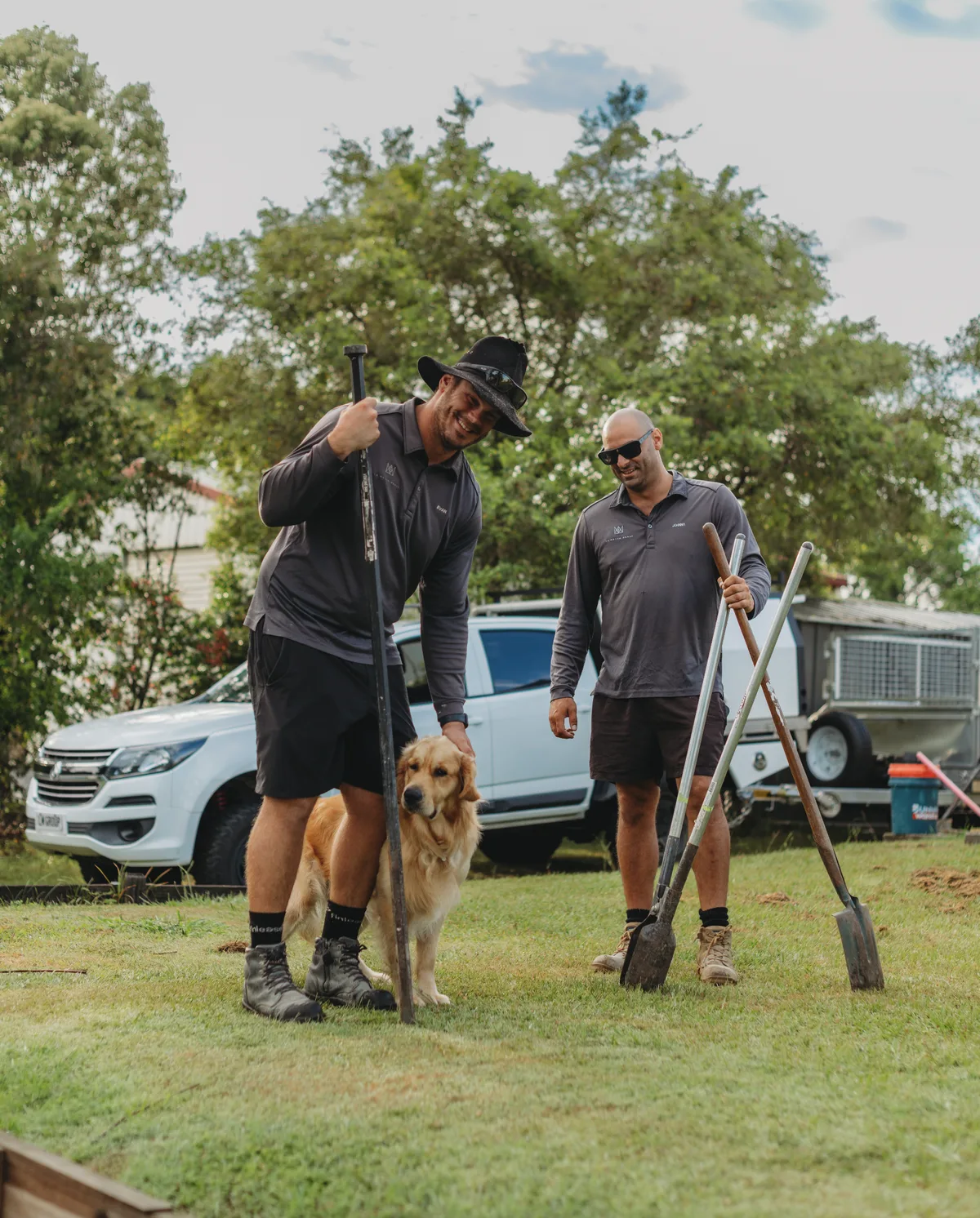 The La Motta Group team with their work ute and golden retriever